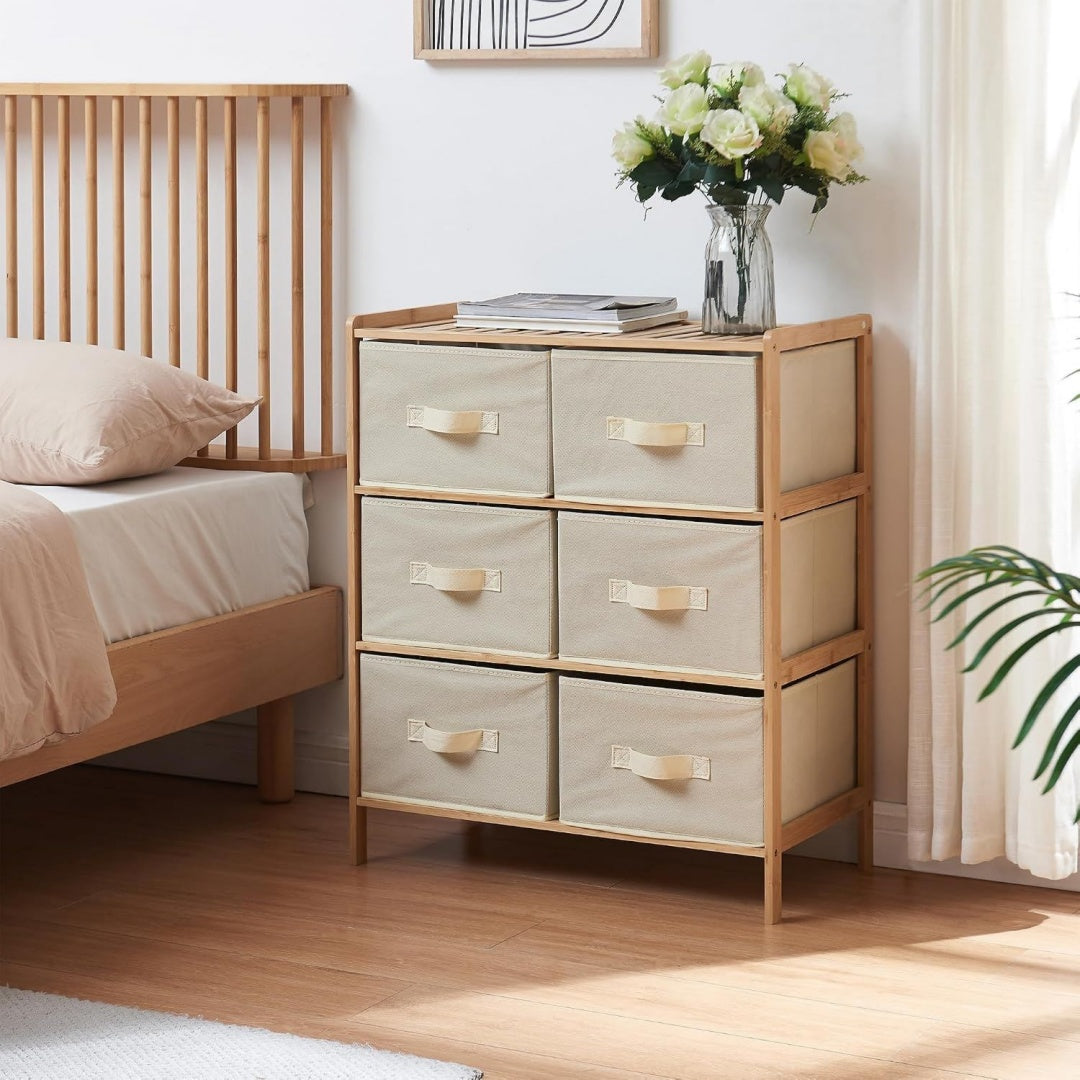 Commode beige rembourre en tissu avec 6 tiroirs